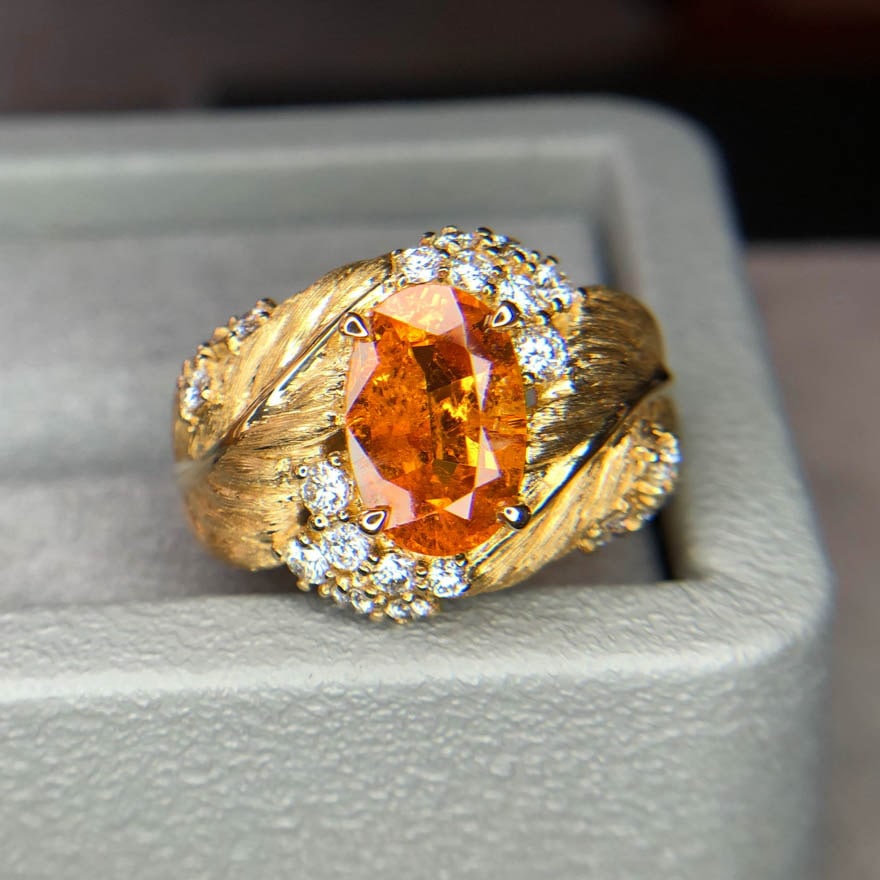 14k Gold 3.85 Ctw Natural Spessartine & Diamond Ring: Ref:231088235 // gold content:14k gold // ring size:7. 25us // // main gemstone:spessartine // shape:oval // carat weight:3. 5ct // color:orange // treatment:natural // // adjacent gemstone 2 :