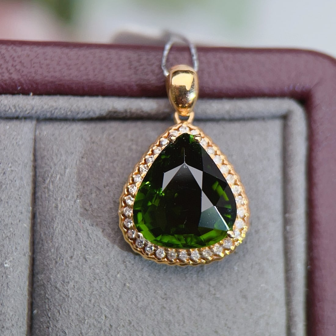14k Gold 4.36 Ctw Natural Tourmaline & Diamond Pendant( Without Chain ): Ref:231088279 // gold content:14k gold // main gemstone:tourmaline // shape:pear // carat weight:4. 35ct // color:green // treatment:natural // // adjacent gemstone 2 : diamond // number of stones:32