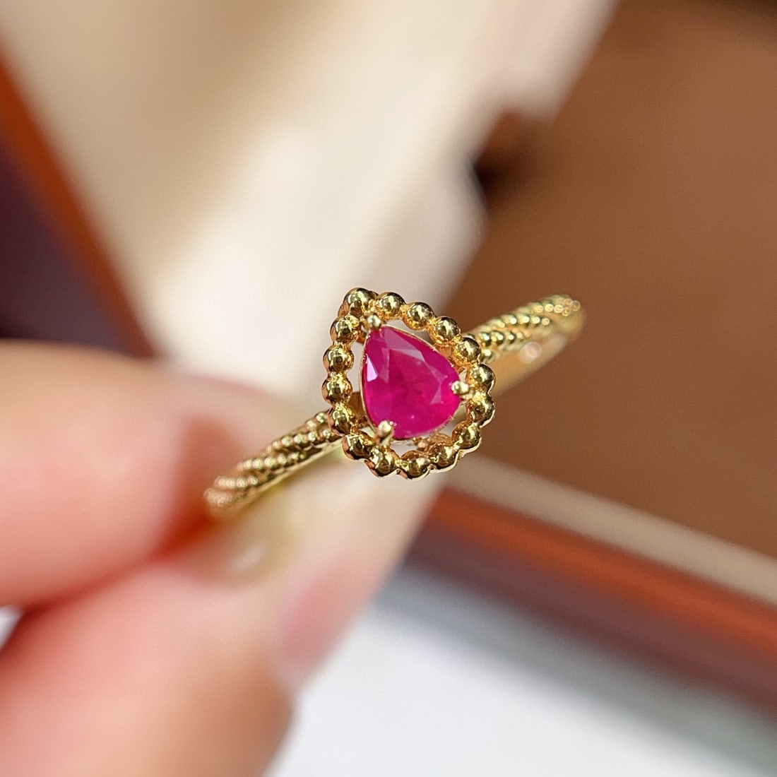 14k Gold 0.53 Ct Natural Ruby Ring: Ref:231088412 // gold content:14k gold // ring size:7. 25us // // main gemstone:ruby // shape:pear // carat weight:0. 53ct // color:red // treatment:natural // Condition: New Low Estimate: 1700.00