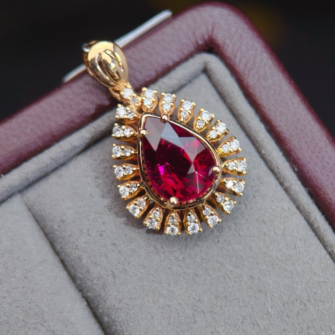 14k Gold 2.8 Ct Natural Tourmaline & Diamond Pendant( Without Chain ): Ref:231088436 // gold content:14k gold // main gemstone:tourmaline // shape:pear // carat weight:2. 8ct // color:red // treatment:natural // // adjacent gemstone 2 : diamond // number of stones:40 //