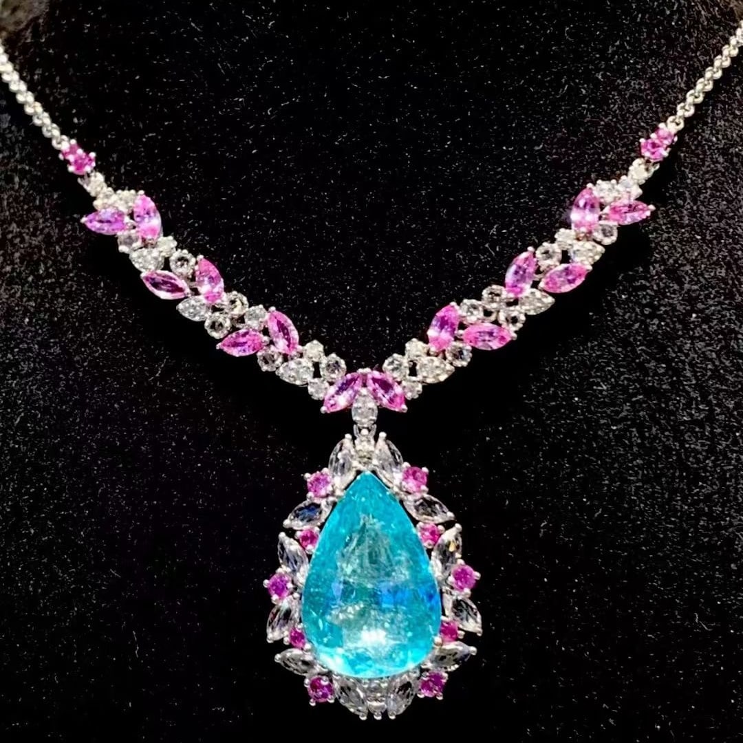 14k Gold 6.19 Ct Natural Paraiba Tourmaline & Coloured Gemstone Necklace: Ref:231091011 // gold content:14k gold // main gemstone:paraiba tourmaline // shape:pear // carat weight:6. 19ct // color:blue // treatment:natural // // adjacent gemstone 2 : coloured gemstone //