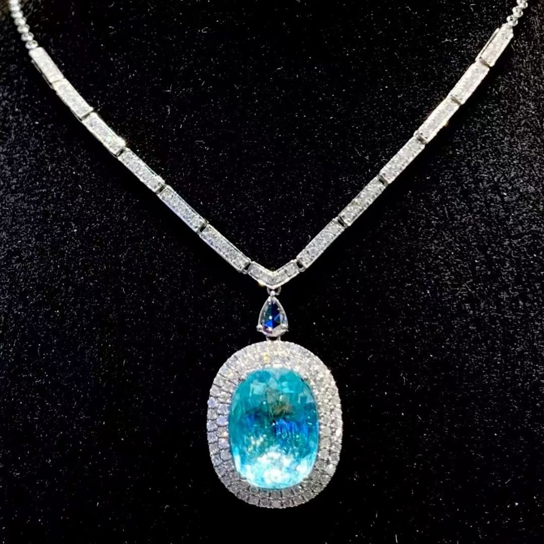 14k Gold 4.43 Ct Natural Paraiba Tourmaline & Diamond Necklace: Ref:231091045 // gold content:14k gold // main gemstone:paraiba tourmaline // shape:oval // carat weight:4. 43ct // color:blue // treatment:natural // // adjacent gemstone 2 : diamond // shape:round /