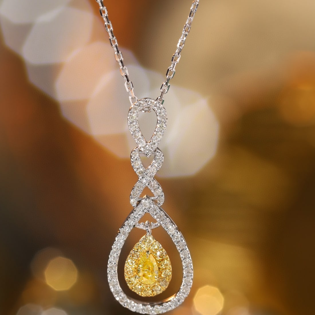 14k Gold 0.40 Ctw Natural Yellow Diamond & Diamond Necklace: Ref:231091076 // gold content:14k gold // main gemstone:yellow diamond // shape:pear // carat weight:0. 14ct // color:yellow // treatment:natural // // adjacent gemstone 2 : diamond // shape:round //