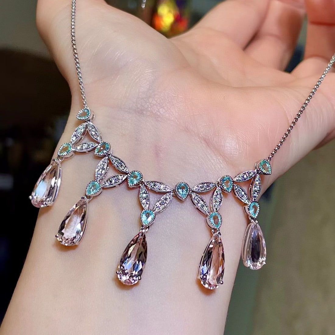 14k Gold 10.27 Ctw Natural Morganite & Paraiba Tourmaline Necklace: Ref:231091088 // gold content:14k gold // main gemstone:morganite // shape:pear // carat weight:8. 98ct // color:pink // treatment:natural // // adjacent gemstone 2 : paraiba tourmaline // shape:pear 