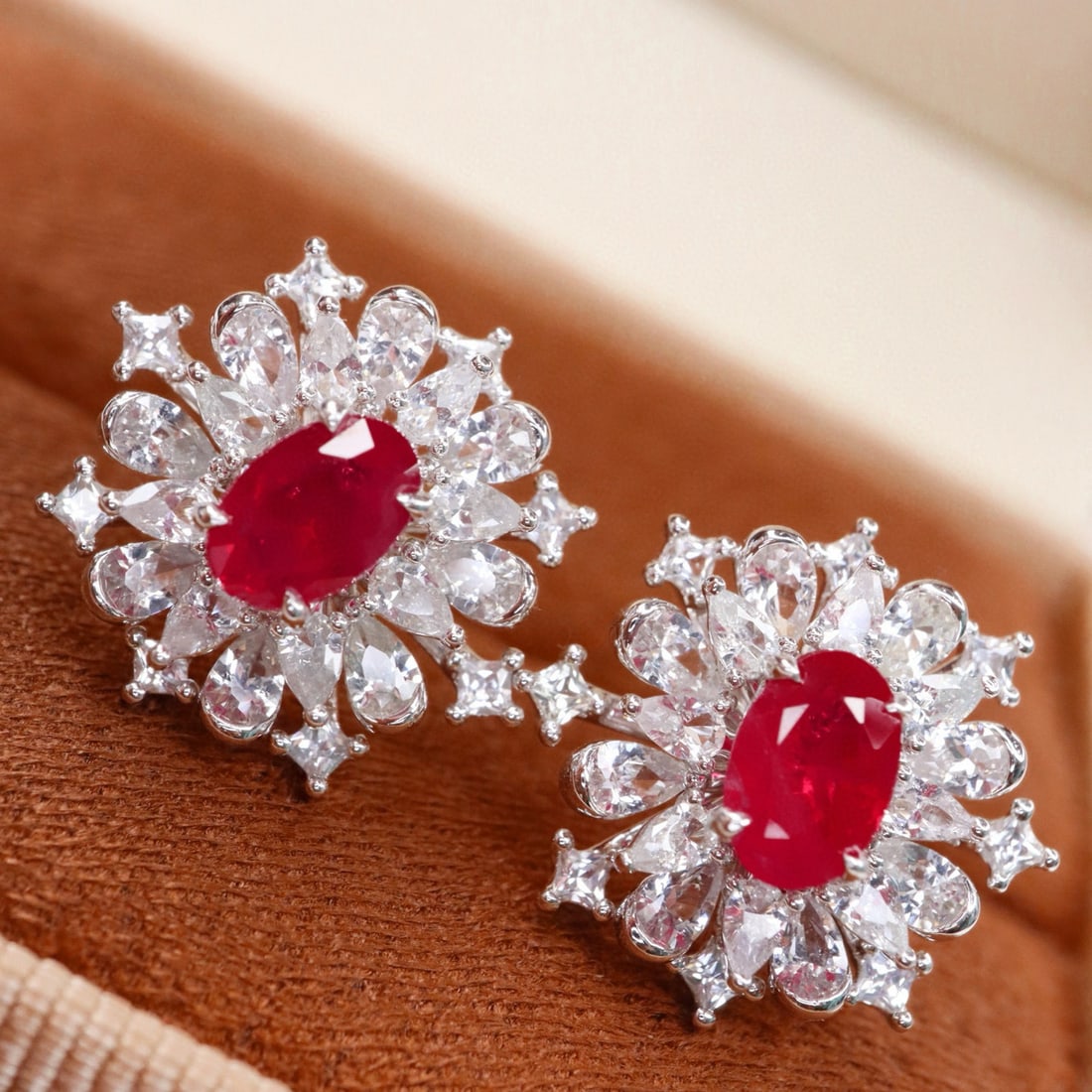 14k Gold 1.29 Ct Natural Ruby & Sapphire Earrings: Ref:231091102 // gold content:14k gold // main gemstone:ruby // shape:oval // carat weight:1. 29ct // color:pigeonblood red // treatment:natural // // adjacent gemstone 2 : sapphire // shape:multiple