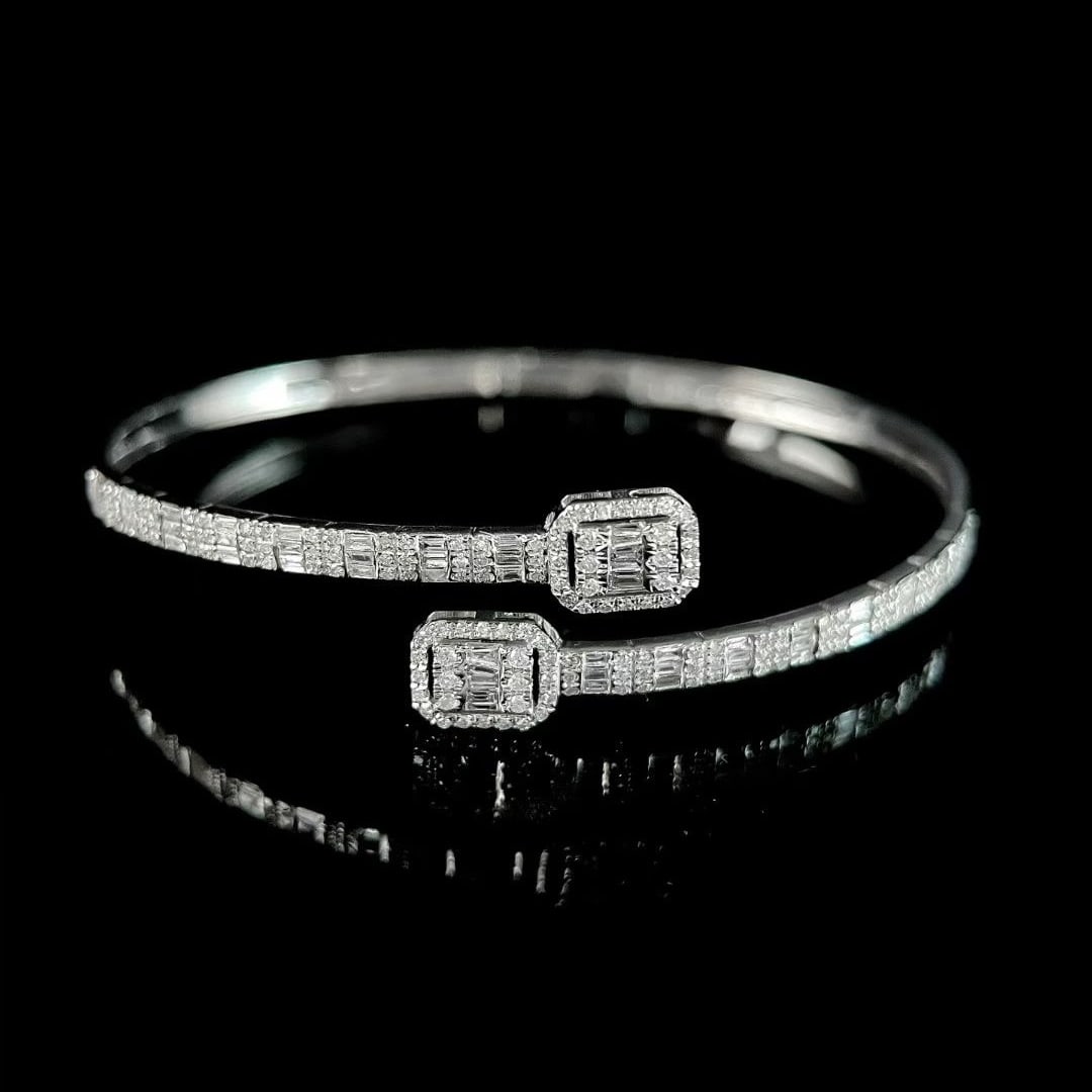 14k Gold 1.2 Ct Natural H Diamond Bangle: Ref:231091116 // gold content:14k gold // main gemstone:diamond // shape:multiple // carat weight:1. 2ct // clarity grade:vs-si // color:h // treatment:natural // Condition: New Low Estimate: 6200.00 