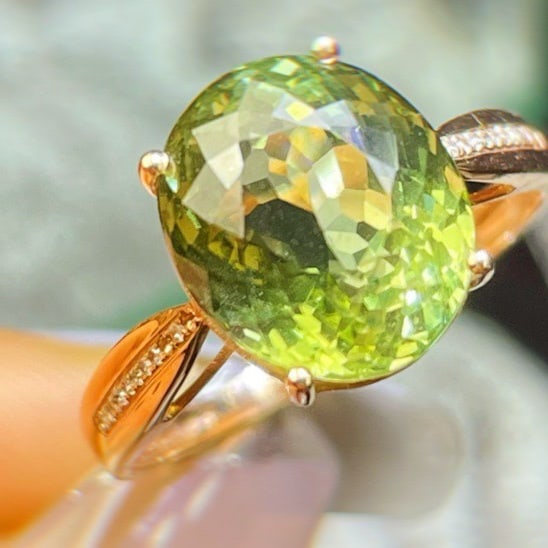 14k Gold 6.17 Ct Natural Tourmaline & Diamond Ring: Ref:231091130 // gold content:14k gold // ring size:7. 25us // // main gemstone:tourmaline // shape:oval // carat weight:6. 17ct // color:green // treatment:natural // // adjacent gemstone 2 :