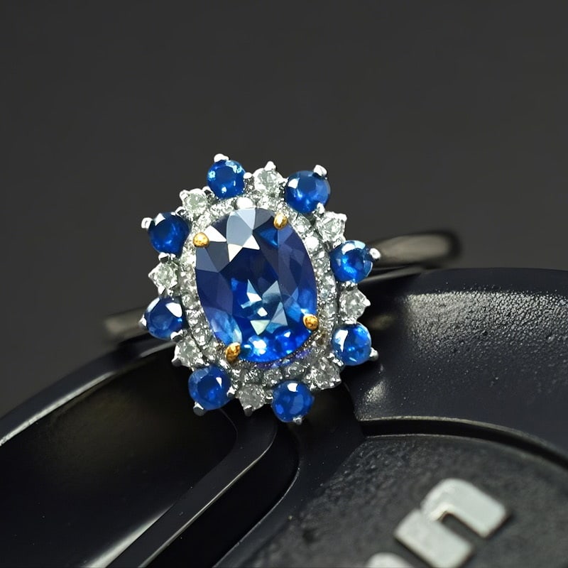 14k Gold 1.23 Ctw Natural Sapphire & Diamond Ring: Ref:231091136 // gold content:14k gold // ring size:7. 25us // // main gemstone:sapphire // shape:oval // carat weight:1. 02ct // color:blue // treatment:natural // // adjacent gemstone 2 : diamond