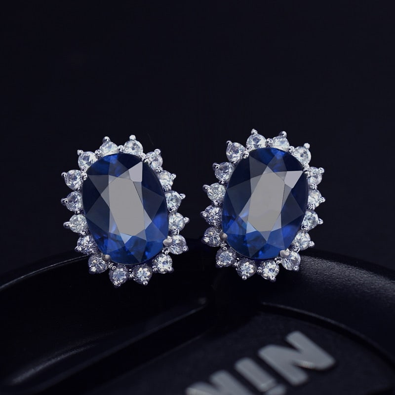 14k Gold 2.92 Ctw Natural Sapphire & Sapphire Earrings: Ref:231091137 // gold content:14k gold // main gemstone:sapphire // shape:oval // carat weight:2. 36ct // color:blue // treatment:natural // // adjacent gemstone 2 : sapphire // shape:round // carat