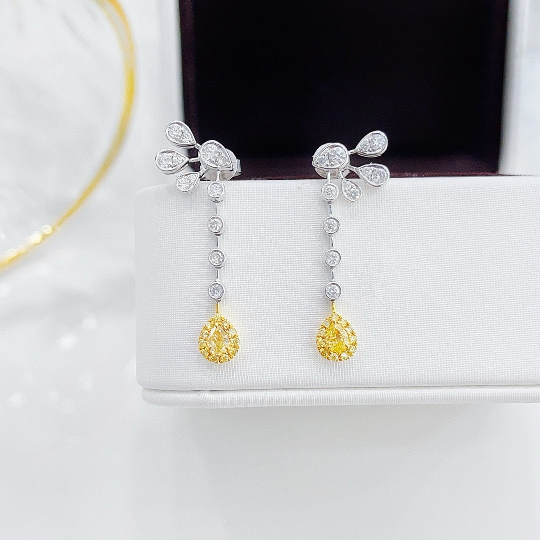 14k Gold 0.68 Ctw Natural Yellow Diamond & Diamond Earrings: Ref:231091157 // gold content:14k gold // main gemstone:yellow diamond // shape:pear // carat weight:0. 22ct // color:yellow // treatment:natural // // adjacent gemstone 2 : diamond // shape:round //