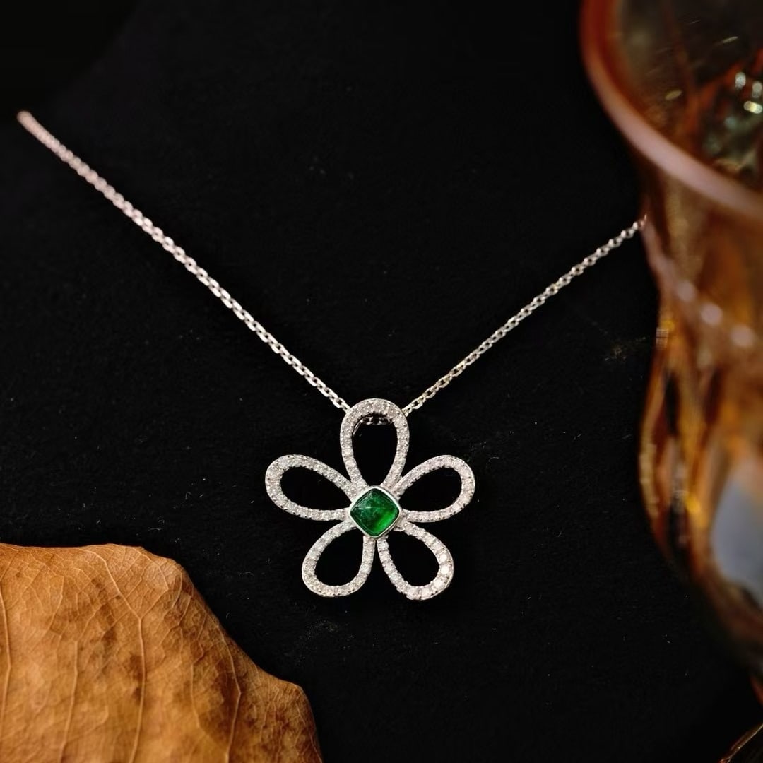 14k Gold 0.72 Ctw Vivid Green Natural Emerald & Diamond & Flowers Pendant( Without Chain ): Ref:231091189 // gold content:14k gold // main gemstone:emerald // shape:sugar-loaf // carat weight:0. 3ct // color:vivid green // treatment:natural // // adjacent gemstone 2 : diamond // shape:round