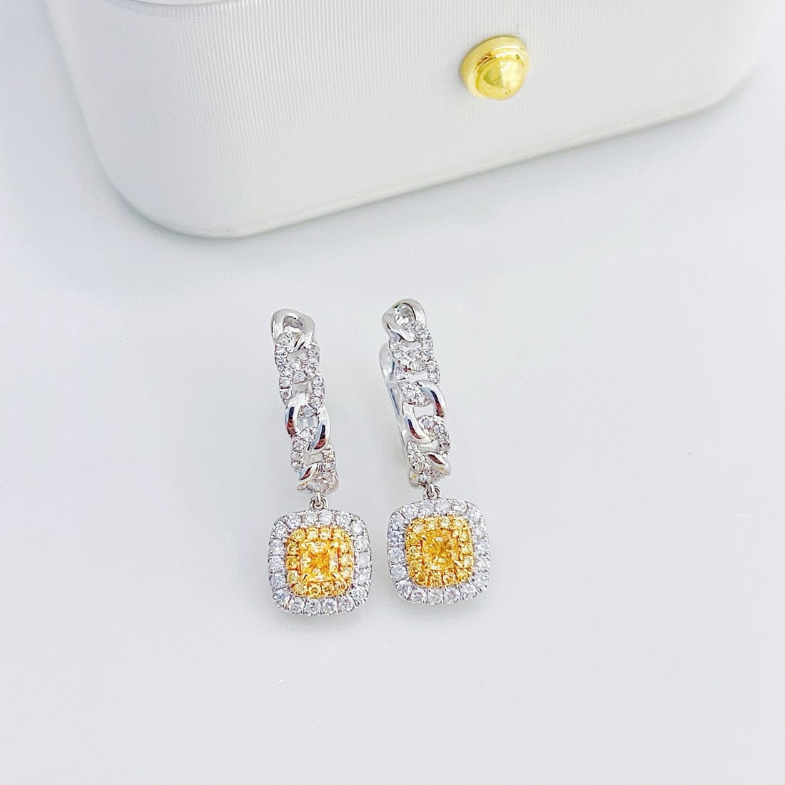 14k Gold 0.80 Ctw Natural Yellow Diamond & Diamond Earrings: Ref:231091194 // gold content:14k gold // main gemstone:yellow diamond // shape:cushion // carat weight:0. 34ct // color:yellow // treatment:natural // // adjacent gemstone 2 : diamond // shape:round 