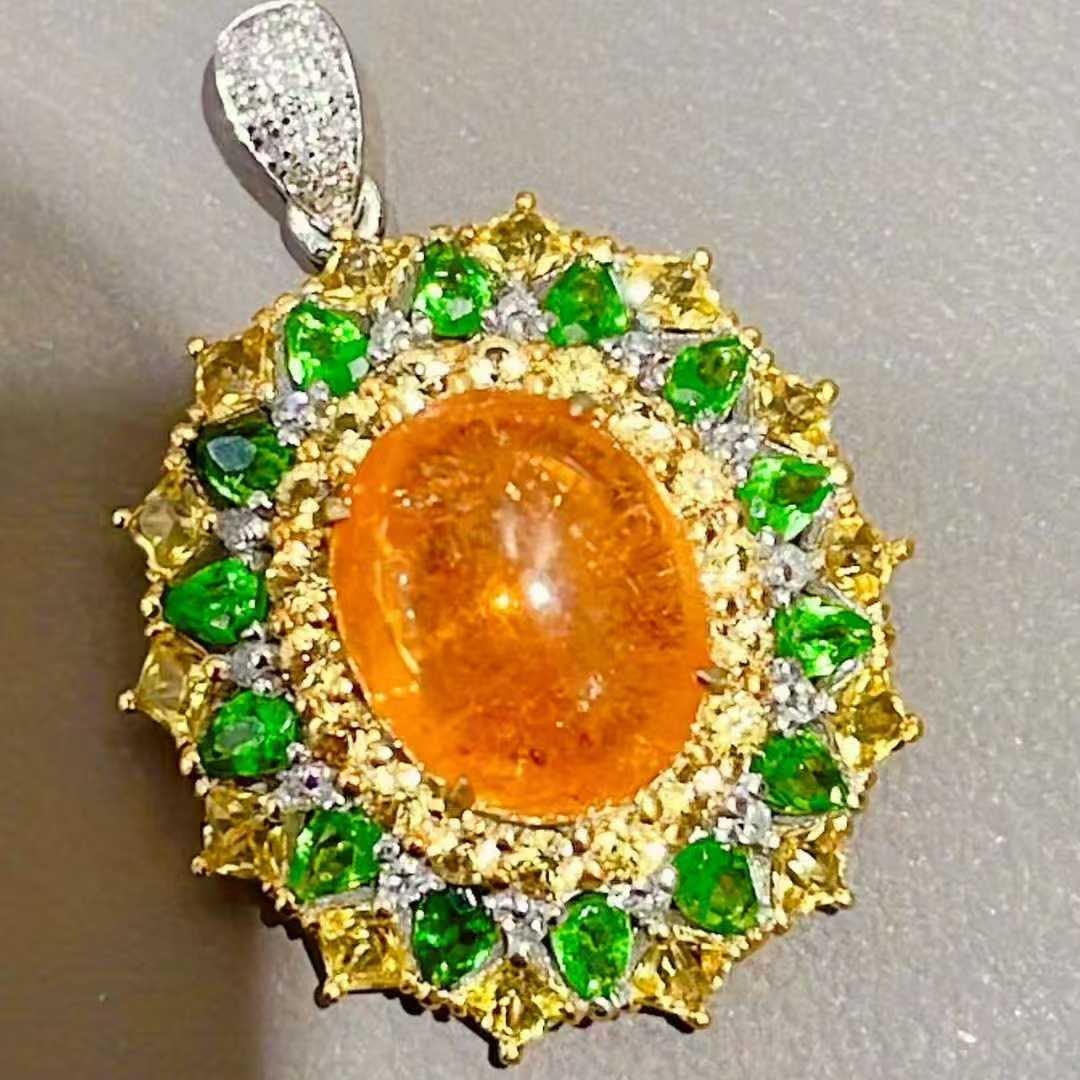 14k Gold 5.1 Ct Natural Spessartine & Diamond Pendant( Without Chain ): Ref:231091209 // gold content:14k gold // main gemstone:spessartine // shape:oval // carat weight:5. 1ct // color:orange // treatment:natural // // adjacent gemstone 2 : diamond // shape:round //