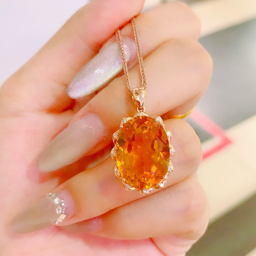 14k Gold 12.76 Ctw Natural Citrine & Diamond Pendant( Without Chain ): Ref:231091212 // gold content:14k gold // main gemstone:citrine // shape:oval // carat weight:12. 7ct // color:yellow // treatment:natural // // adjacent gemstone 2 : diamond // number of stones:12