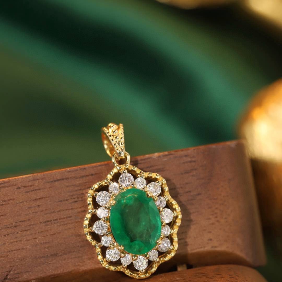 14k Gold 1.51 Ctw Natural Emerald & Diamond Pendant( Without Chain ): Ref:231091233 // gold content:14k gold // main gemstone:emerald // shape:oval // carat weight:1. 19ct // color:green // treatment:natural // // adjacent gemstone 2 : diamond // shape:round // carat