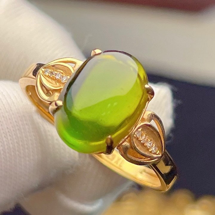 14k Gold 3.8 Ct Natural Tourmaline & Diamond Ring: Ref:231091251 // gold content:14k gold // ring size:7. 25us // // main gemstone:tourmaline // shape:oval // carat weight:3. 8ct // color:green // treatment:natural // // adjacent gemstone 2 : diamond