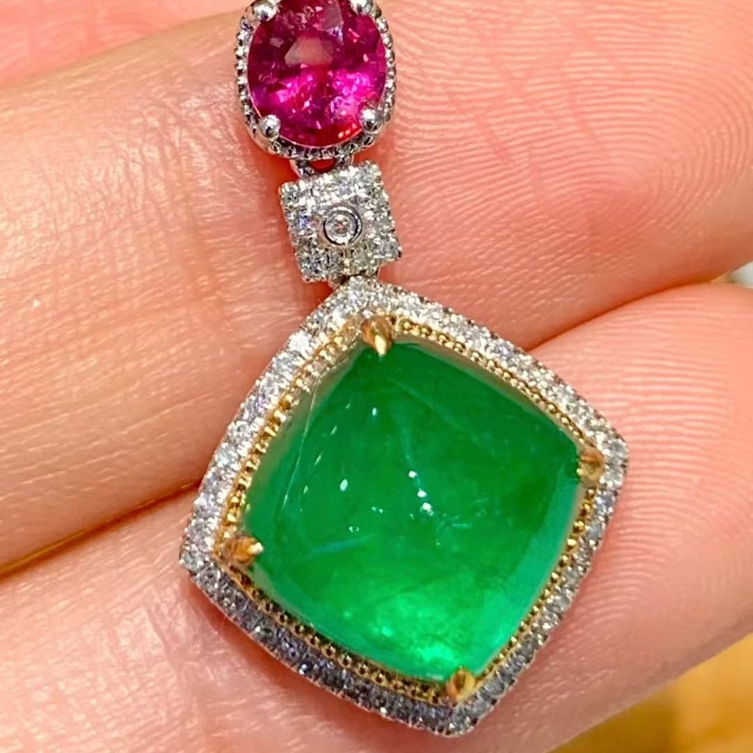 14k Gold 4.6 Ctw Vivid Green Natural Emerald & Ruby Pendant( Without Chain ): Ref:231091254 // gold content:14k gold // main gemstone:emerald // shape:sugar-loaf // carat weight:4. 1ct // color:vivid green // treatment:natural // // adjacent gemstone 2 : ruby // shape:oval //
