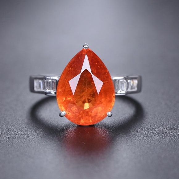 14k Gold 7.44 Ctw Natural Spessartine & Diamond Ring: Ref:231092003 // gold content:14k gold // ring size:7. 25us // // main gemstone:spessartine // shape:pear // carat weight:7. 2ct // color:orange // treatment:natural // // adjacent gemstone 2 :