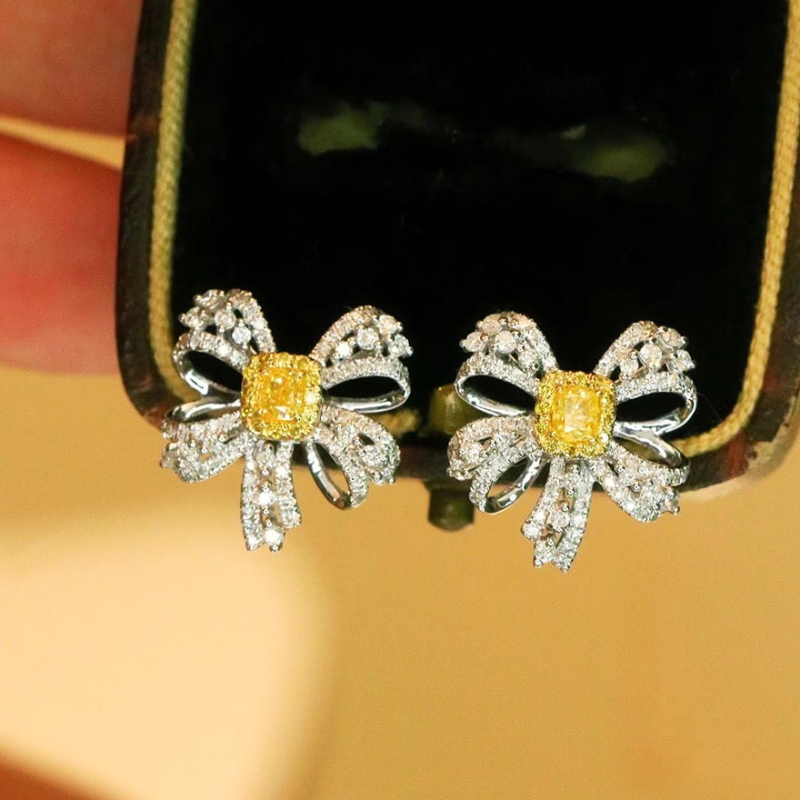 14k Gold 0.86 Ct Natural Color Diamond Earrings: Ref:231092132 // gold content:14k gold // main gemstone:diamond // shape:multiple // carat weight:0. 86ct // clarity grade:vs-si // color:color // treatment:natural // Condition: New Low Estimate: