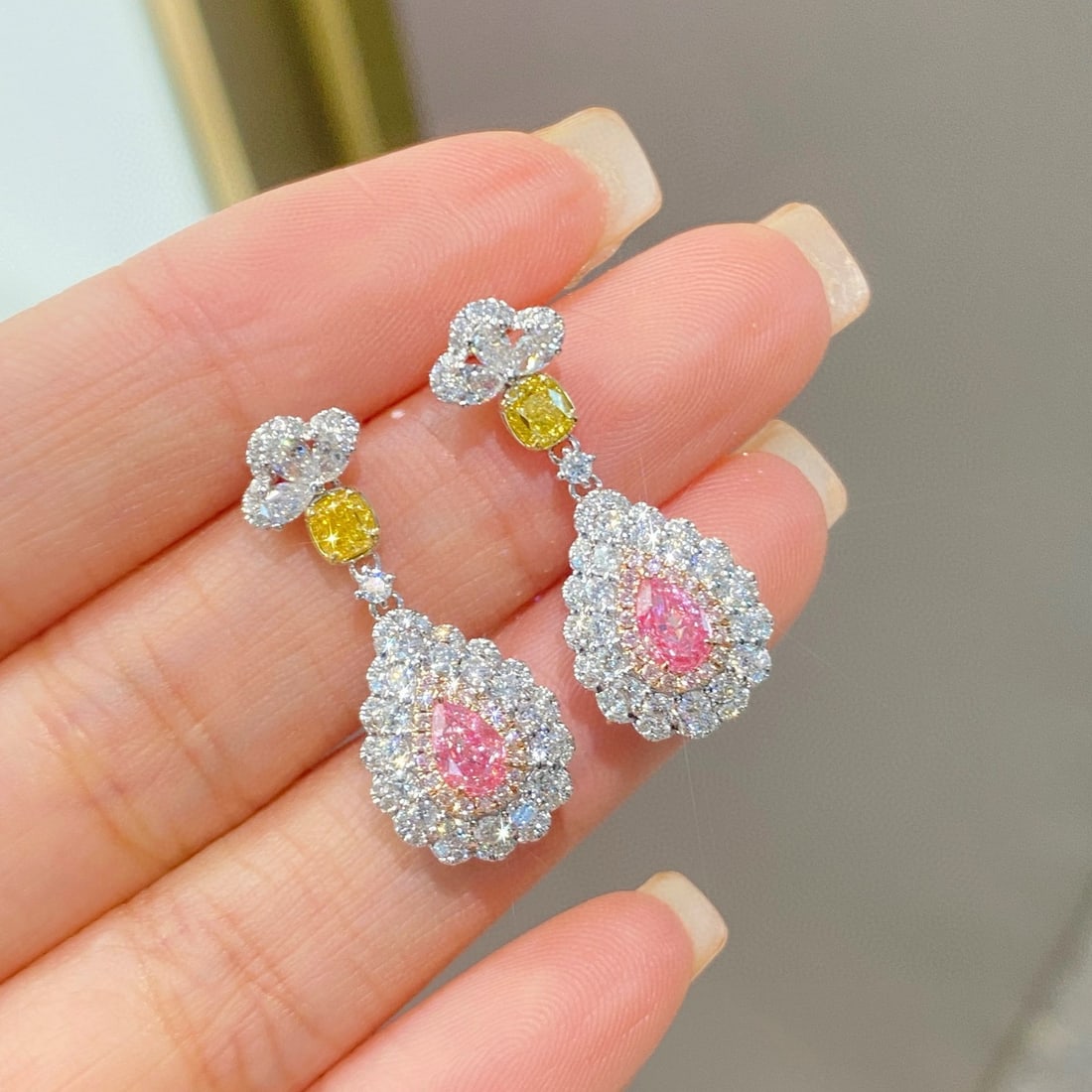 Gia Certified 14k Gold 2.38 Ctw Natural Pink Diamond & Diamond Earrings: Ref:231092144 // gold content:14k gold // main gemstone:pink diamond // certified:gia // shape:pear // carat weight:0. 60ct // clarity grade:si1 // color:pink // treatment:natural //