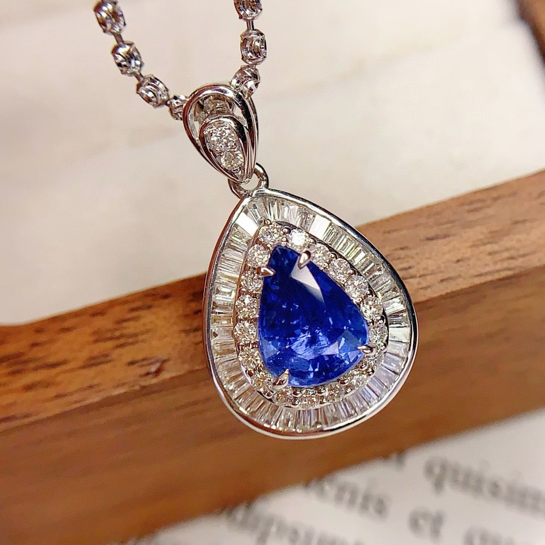 14k Gold 2 Ct Natural Sapphire & Diamond Pendant( Without Chain ): Ref:231092145 // gold content:14k gold // main gemstone:sapphire // shape:pear // carat weight:2ct // color:blue // treatment:natural // // adjacent gemstone 2 : diamond // number of stones:63 //