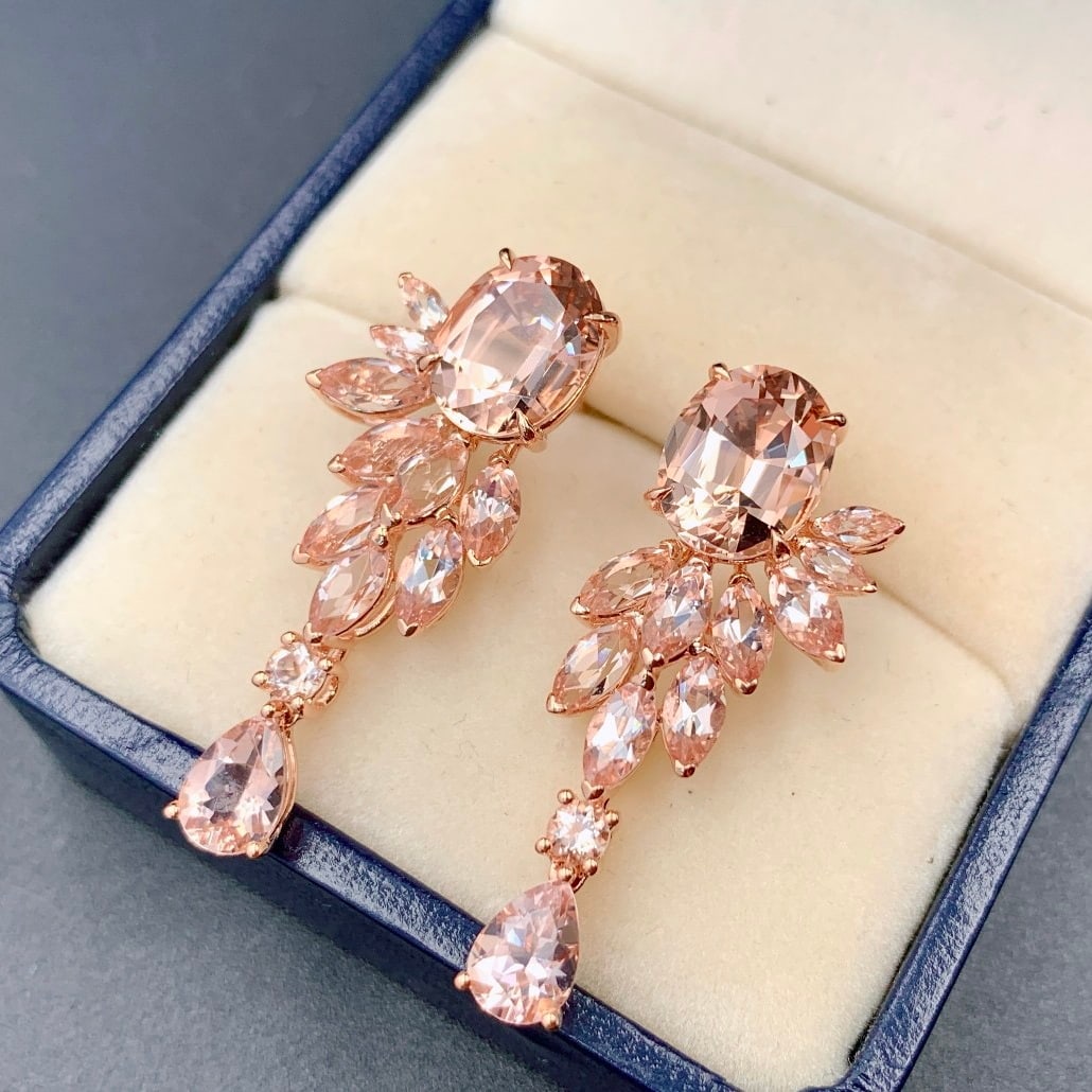 14k Gold 9.83 Ct Natural Morganite Earrings: Ref:231092172 // gold content:14k gold // main gemstone:morganite // shape:multiple // carat weight:9. 83ct // color:pink // treatment:natural // Condition: New Low Estimate: 5100.00 High Estimate: