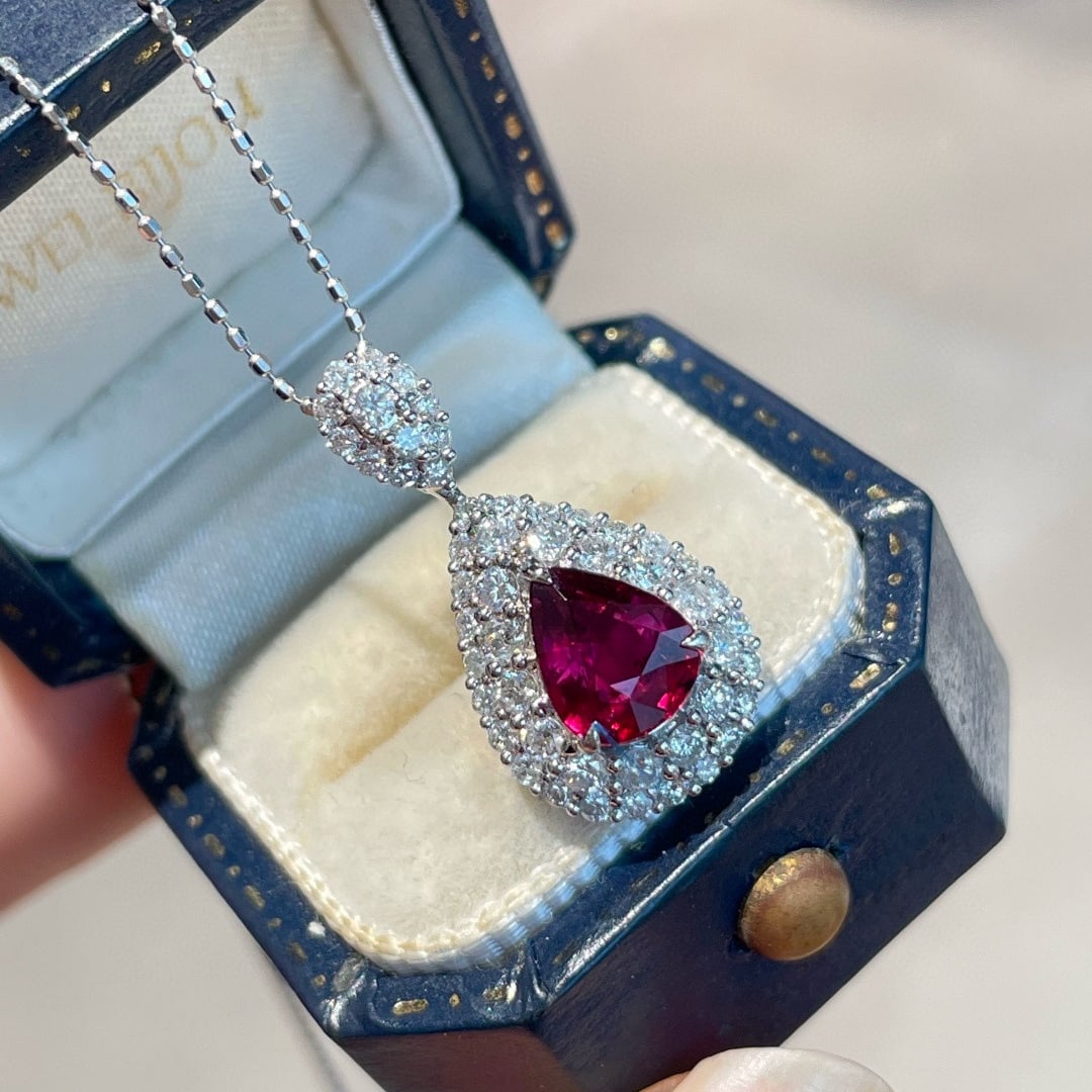14k Gold 1.03 Ct Natural Ruby & Diamond Pendant( Without Chain ): Ref:231092185 // gold content:14k gold // main gemstone:ruby // shape:pear // carat weight:1. 03ct // color:red // treatment:natural // // adjacent gemstone 2 : diamond // shape:round // clarity grade