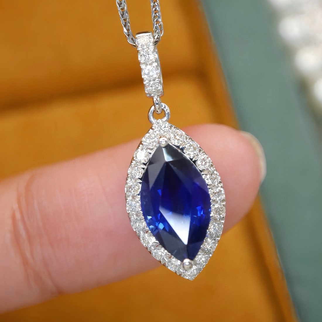 14k Gold 2.14 Ctw Natural Sapphire & Diamond Pendant( Without Chain ): Ref:231092189 // gold content:14k gold // main gemstone:sapphire // shape:marquise // carat weight:1. 90ct // color:royal blue // treatment:natural // // adjacent gemstone 2 : diamond // number of