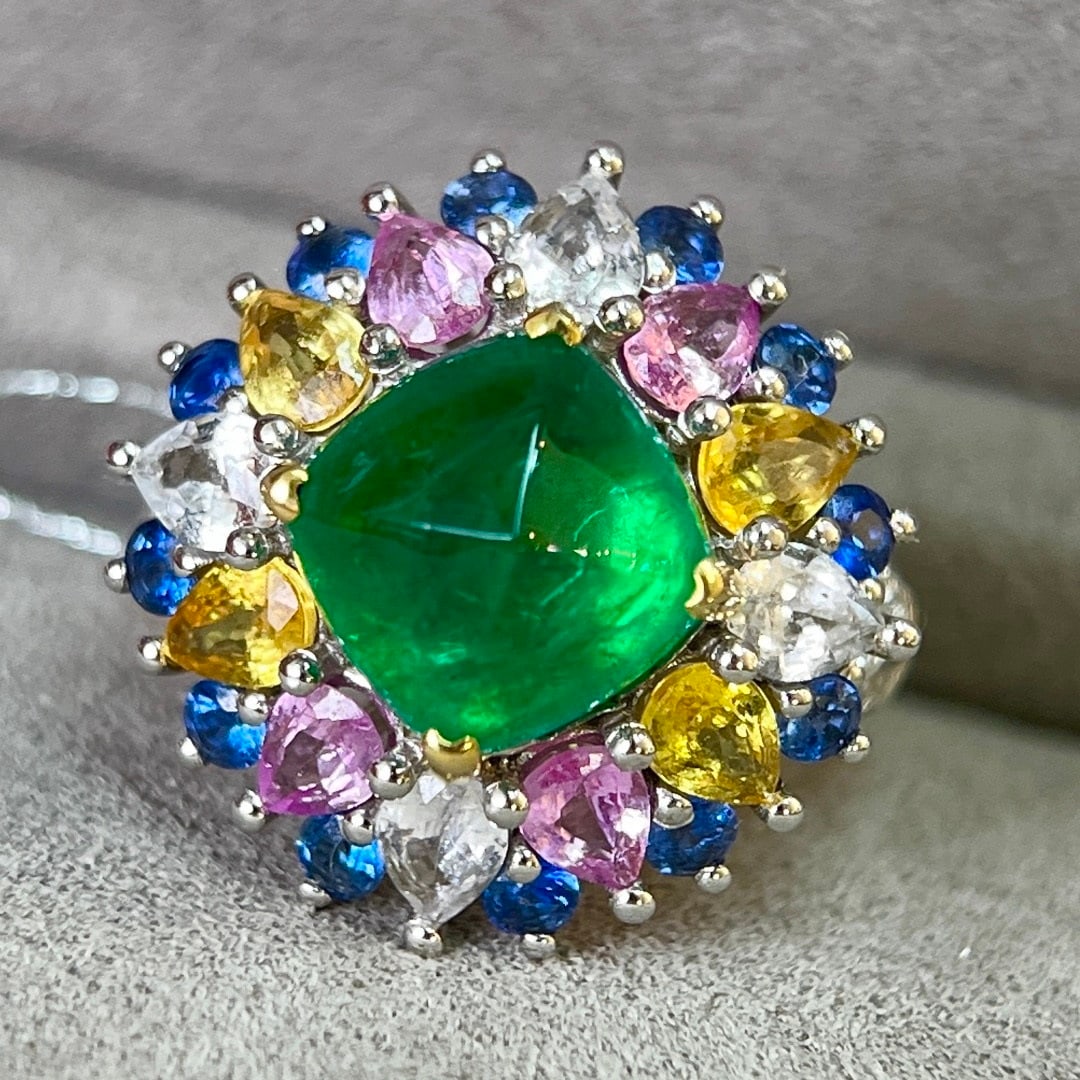 14k Gold 7.80 Ctw Vivid Green Natural Emerald & Sapphire Ring: Ref:231092315 // gold content:14k gold // ring size:7. 25us // // main gemstone:emerald // shape:sugar-loaf // carat weight:3. 30ct // color:vivid green // treatment:natural // // adjacent gemstone 2 