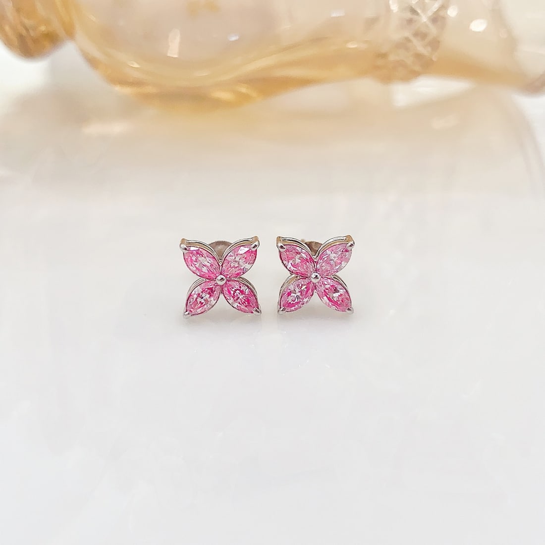 14k Gold 0.70 Ct Natural Pink Diamond Earrings: Ref:231092329 // gold content:14k gold // main gemstone:pink diamond // shape:marquise // carat weight:0. 70ct // color:pink // treatment:natural // Condition: New Low Estimate: 8100.00 High