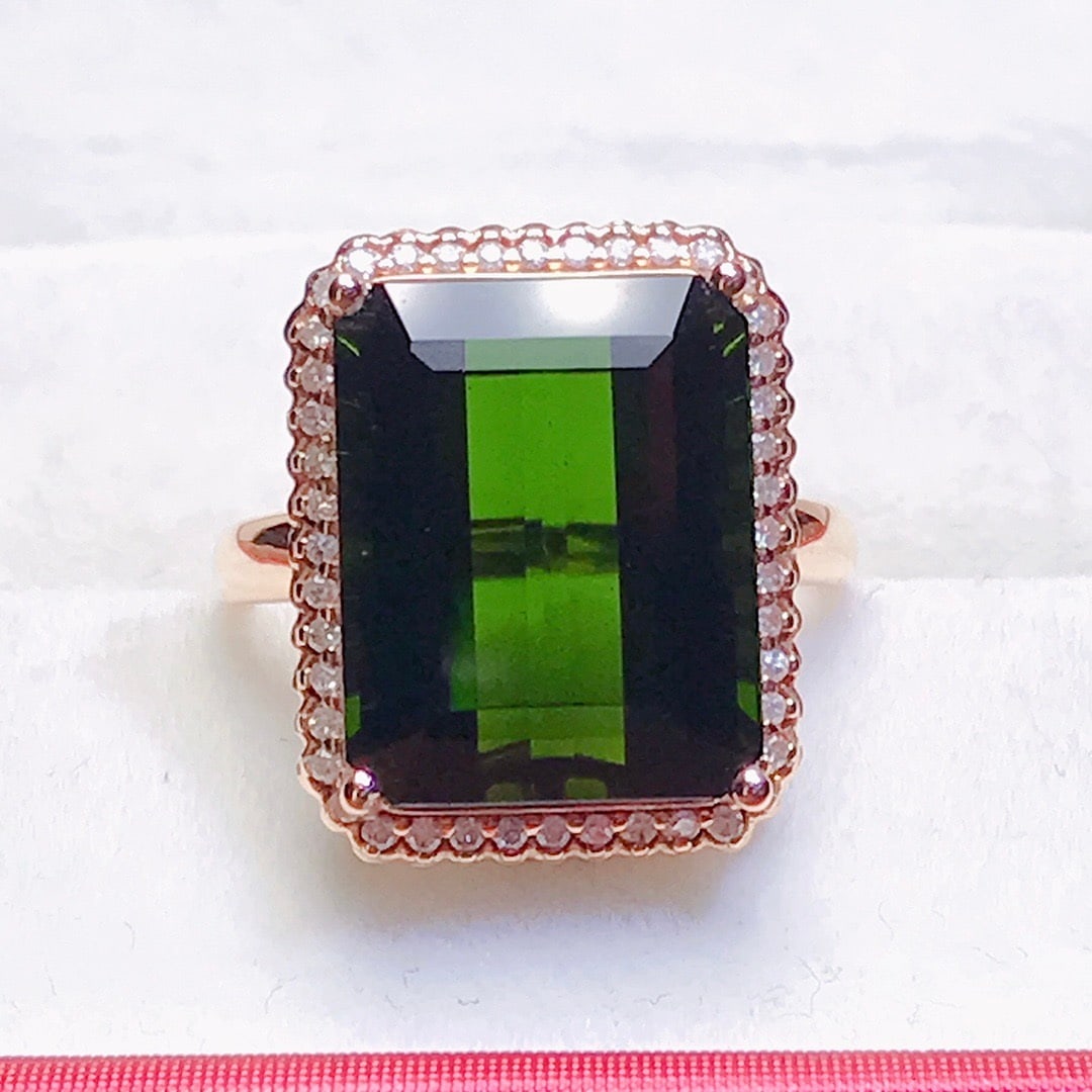 14k Gold 12 Ct Natural Tourmaline & Diamond Ring: Ref:231092330 // gold content:14k gold // ring size:7. 25us // // main gemstone:tourmaline // shape:octagonal // carat weight:12ct // color:green // treatment:natural // // adjacent gemstone 2 :