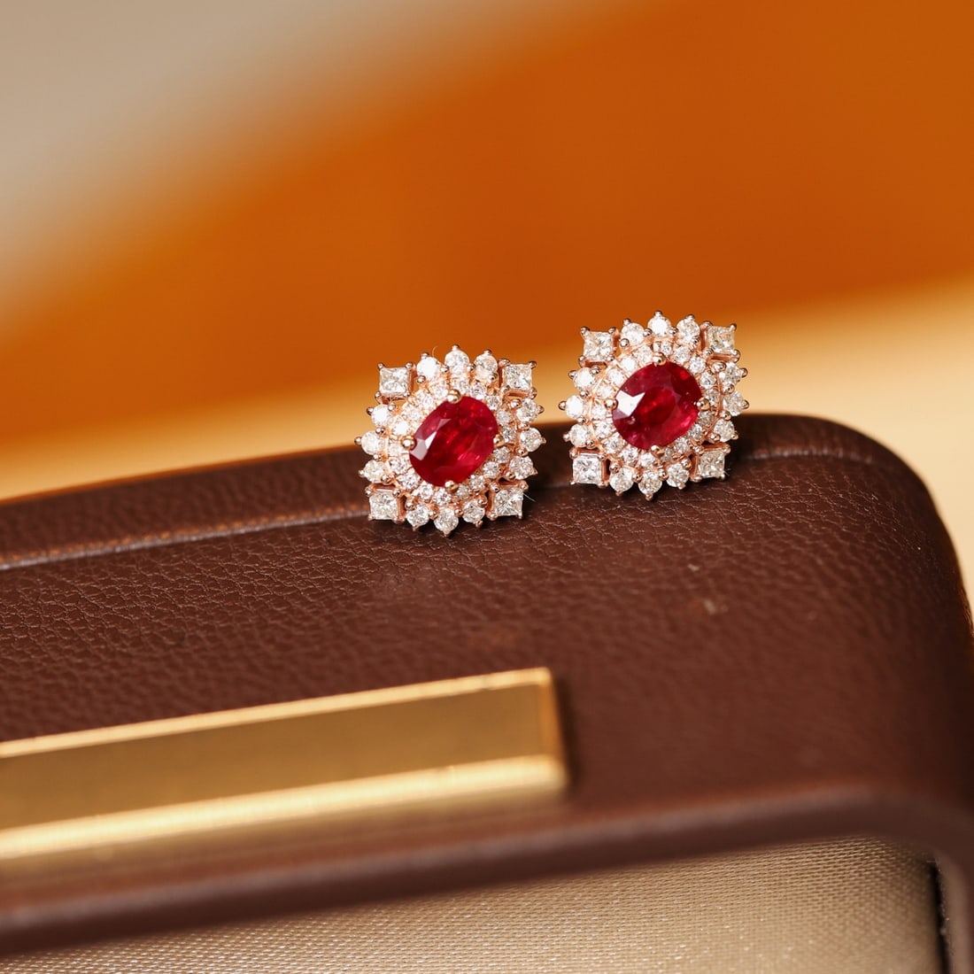 14k Gold 0.90 Ctw Natural Ruby & Diamond Earrings: Ref:231092331 // gold content:14k gold // main gemstone:ruby // shape:oval // carat weight:0. 60ct // color:pigeonblood red // treatment:natural // // adjacent gemstone 2 : diamond // shape:multiple