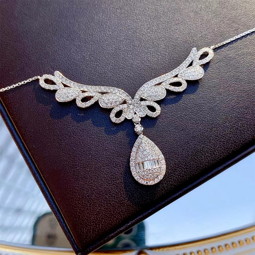 14k Gold 1 Ct Natural H Diamond Necklace: Ref:231092362 // gold content:14k gold // main gemstone:diamond // shape:multiple // carat weight:1ct // clarity grade:vs-si // color:h // treatment:natural // Condition: New Low Estimate: 4000.00