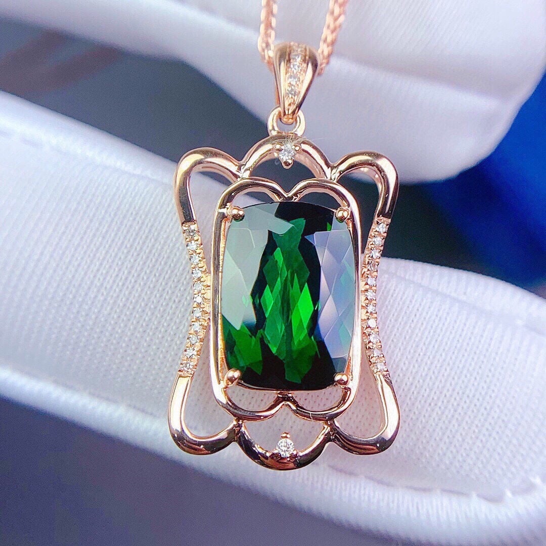 14k Gold 5.2 Ct Natural Tourmaline & Diamond Pendant( Without Chain ): Ref:231092368 // gold content:14k gold // main gemstone:tourmaline // shape:cushion // carat weight:5. 2ct // color:green // treatment:natural // // adjacent gemstone 2 : diamond // shape:round //