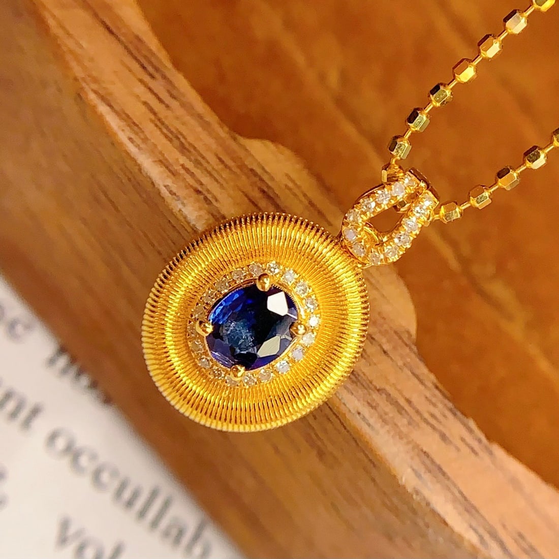 14k Gold 0.45 Ct Natural Sapphire & Diamond Pendant( Without Chain ): Ref:231092392 // gold content:14k gold // main gemstone:sapphire // shape:oval // carat weight:0. 45ct // color:blue // treatment:natural // // adjacent gemstone 2 : diamond // number of stones:33 //