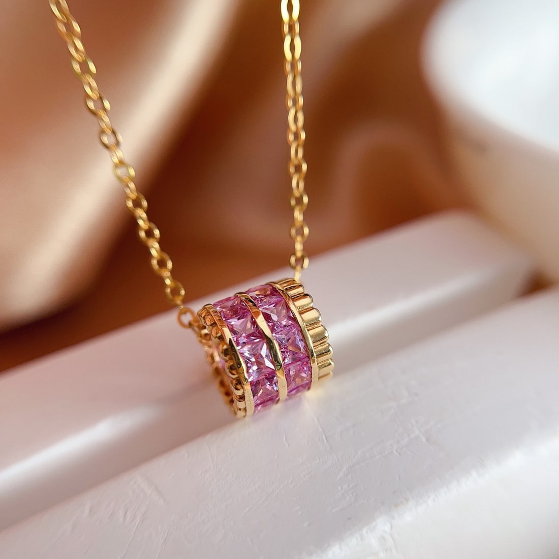 14k Gold 2.60 Ct Natural Sapphire Pendant( Without Chain ): Ref:231092395 // gold content:14k gold // main gemstone:sapphire // shape:princess // carat weight:2. 60ct // color:pink // treatment:natural // Condition: New Low Estimate: 2200.00 High Estimate: