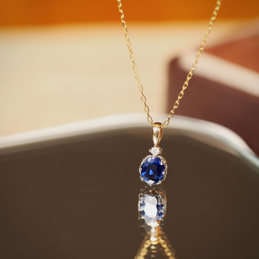 14k Gold 0.59 Ctw Natural Sapphire & Diamond Necklace: Ref:231092423 // gold content:14k gold // main gemstone:sapphire // shape:oval // carat weight:0. 55ct // color:blue // treatment:natural // // adjacent gemstone 2 : diamond // shape:round // carat