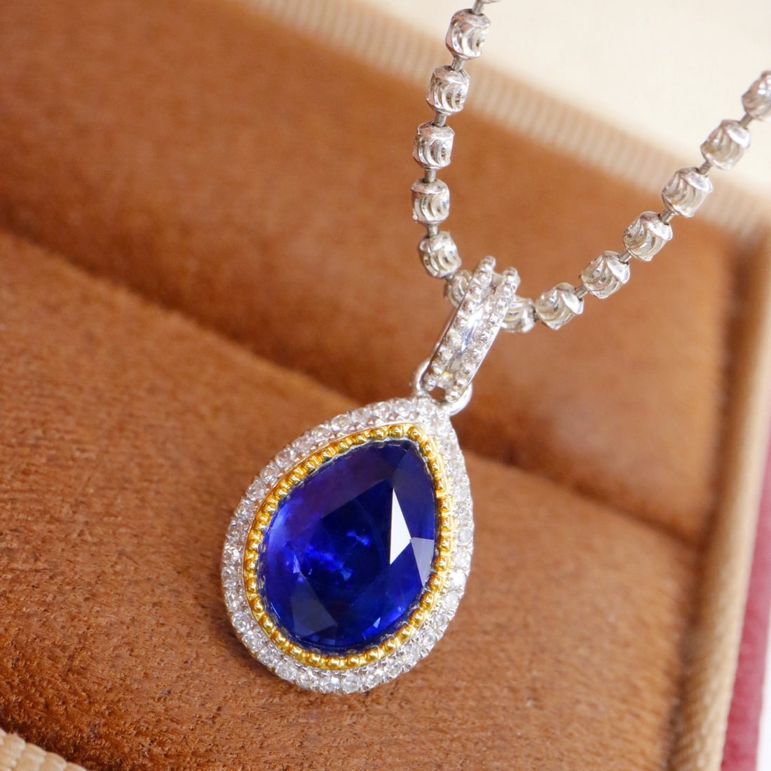 14k Gold 1.63 Ctw Natural Sapphire & Diamond Pendant( Without Chain ): Ref:231092425 // gold content:14k gold // main gemstone:sapphire // shape:pear // carat weight:1. 52ct // color:royal blue // treatment:natural // // adjacent gemstone 2 : diamond // shape:round //