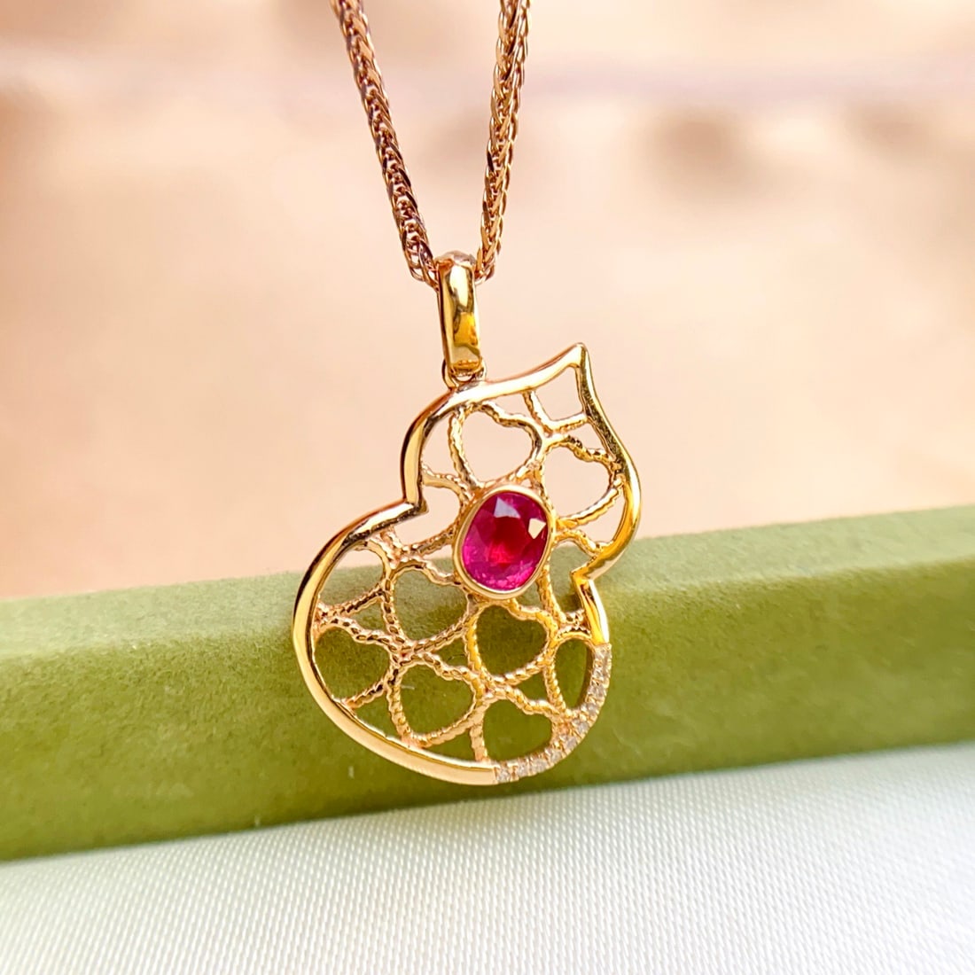 14k Gold 0.40 Ct Natural Ruby & Diamond Pendant( Without Chain ): Ref:231092442 // gold content:14k gold // main gemstone:ruby // shape:oval // carat weight:0. 40ct // color:red // treatment:natural // // adjacent gemstone 2 : diamond // number of stones:10 //