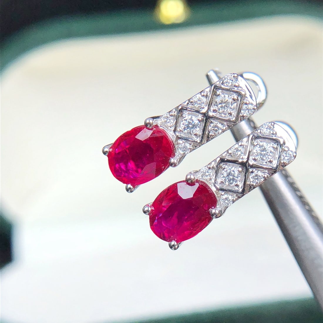 14k Gold 1.58 Ctw Natural Ruby & Diamond Earrings: Ref:231092446 // gold content:14k gold // main gemstone:ruby // shape:oval // carat weight:1. 42ct // color:red // treatment:natural // // adjacent gemstone 2 : diamond // shape:round // carat weight: