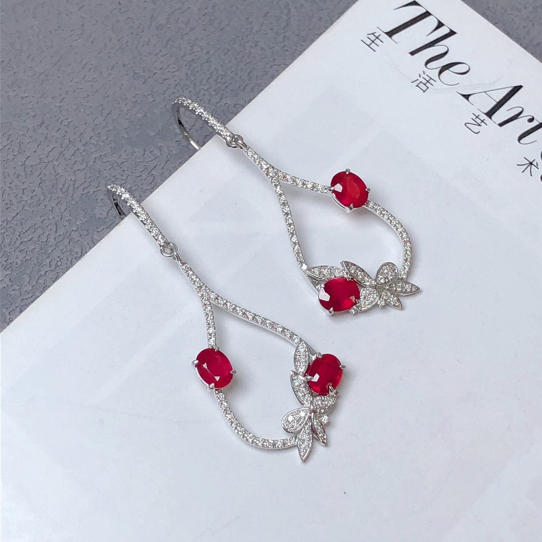 14k Gold 2.01 Ctw Natural Ruby & Diamond Earrings: Ref:231092447 // gold content:14k gold // main gemstone:ruby // shape:oval // carat weight:1. 62ct // color:pigeonblood red // treatment:natural // // adjacent gemstone 2 : diamond // shape:round //