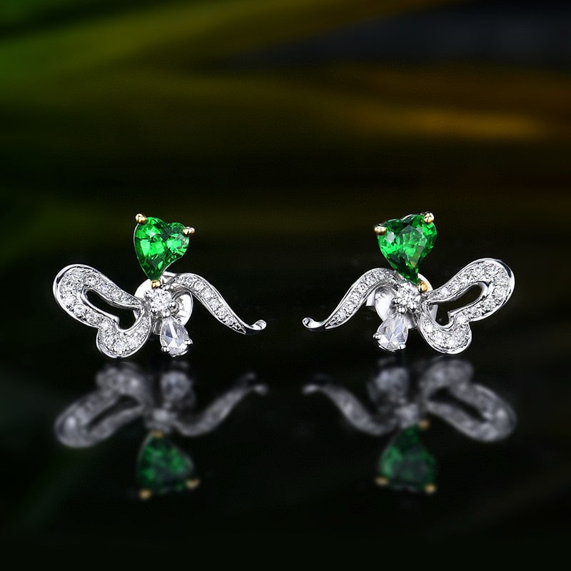 14k Gold 0.99 Ctw Natural Tsavorite & Diamond Earrings: Ref:231093011 // gold content:14k gold // main gemstone:tsavorite // shape:other // carat weight:0. 75ct // color:green // treatment:natural // // adjacent gemstone 2 : diamond // number of stones:44