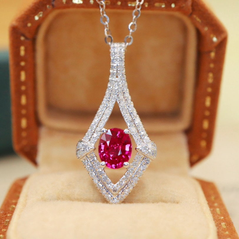 14k Gold 0.91 Ctw Natural Ruby & Diamond Pendant( Without Chain ): Ref:231093067 // gold content:14k gold // main gemstone:ruby // shape:oval // carat weight:0. 65ct // color:red // treatment:natural // // adjacent gemstone 2 : diamond // number of stones:87 //