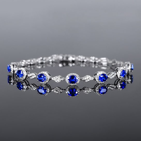 14k Gold 3.05 Ctw Natural Sapphire & Diamond Bracelet: Ref:231093105 // gold content:14k gold // main gemstone:sapphire // shape:oval // carat weight:2. 50ct // color:blue // treatment:natural // // adjacent gemstone 2 : diamond // number of stones:183