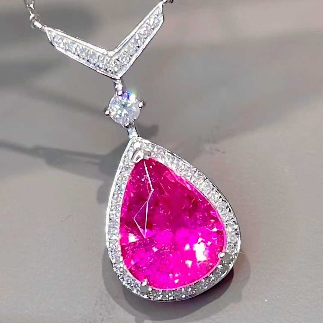 14k Gold 3 Ct Natural Tourmaline & Diamond Necklace: Ref:231093174 // gold content:14k gold // main gemstone:tourmaline // shape:pear // carat weight:3ct // color:red // treatment:natural // // adjacent gemstone 2 : diamond // shape:round // clarity