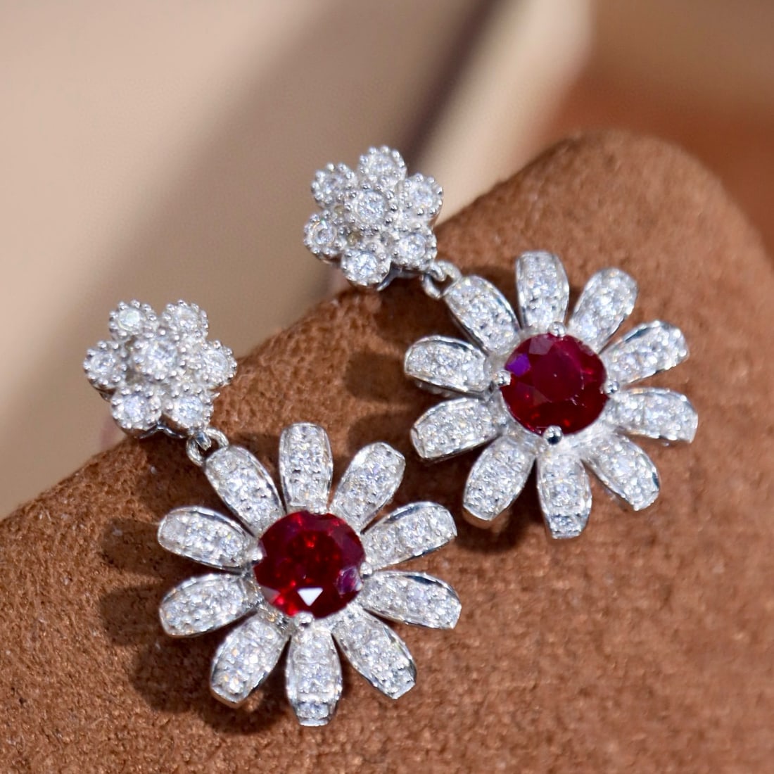14k Gold 1.46 Ctw Natural Ruby & Diamond Earrings: Ref:231093184 // gold content:14k gold // main gemstone:ruby // shape:round // carat weight:1. 02ct // color:red // treatment:natural // cut grade:g // // adjacent gemstone 2 : diamond // shape:round 