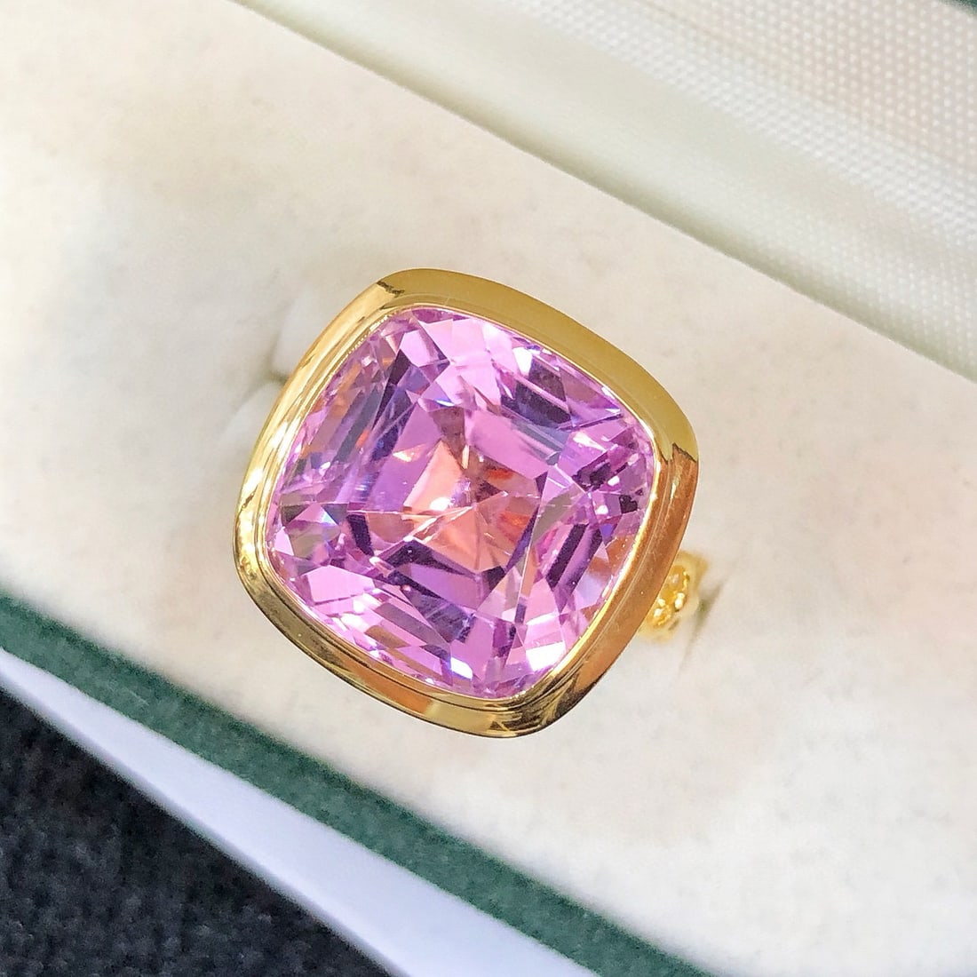 14k Gold 16.0 Ct Natural Kunzite Ring: Ref:231093208 // gold content:14k gold // ring size:7. 25us // // main gemstone:kunzite // shape:cushion // carat weight:16. 0ct // color:purple // treatment:natural // Condition: New Low Estimate: 51