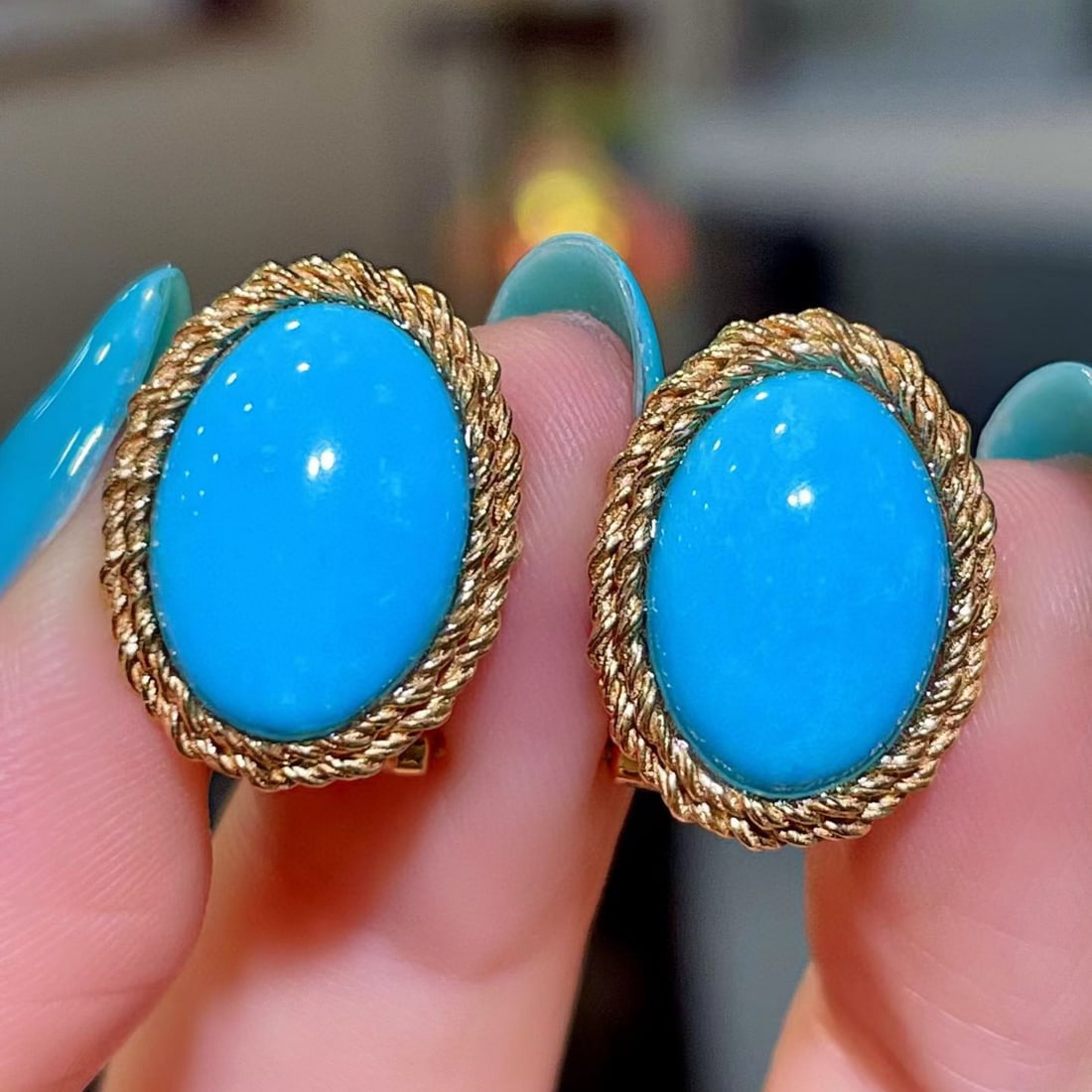 14k Gold 7.83 Ct Natural Blue Turquoise Earrings: Ref:231093215 // gold content:14k gold // main gemstone:blue turquoise // shape:oval // carat weight:7. 83ct // color:blue // treatment:natural // Condition: New Low Estimate: 4800.00 High Estimate: