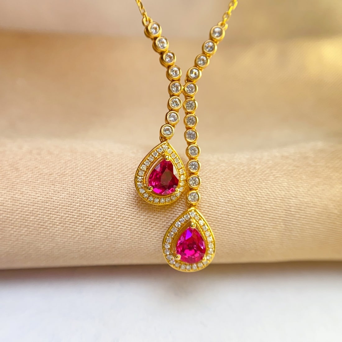 14k Gold 1.00 Ct Natural Ruby & Diamond & Sapphire Necklace: Ref:231094029 // gold content:14k gold // main gemstone:ruby // shape:pear // carat weight:1. 00ct // color:red // treatment:natural // // adjacent gemstone 2 : diamond // number of stones:48 // shape