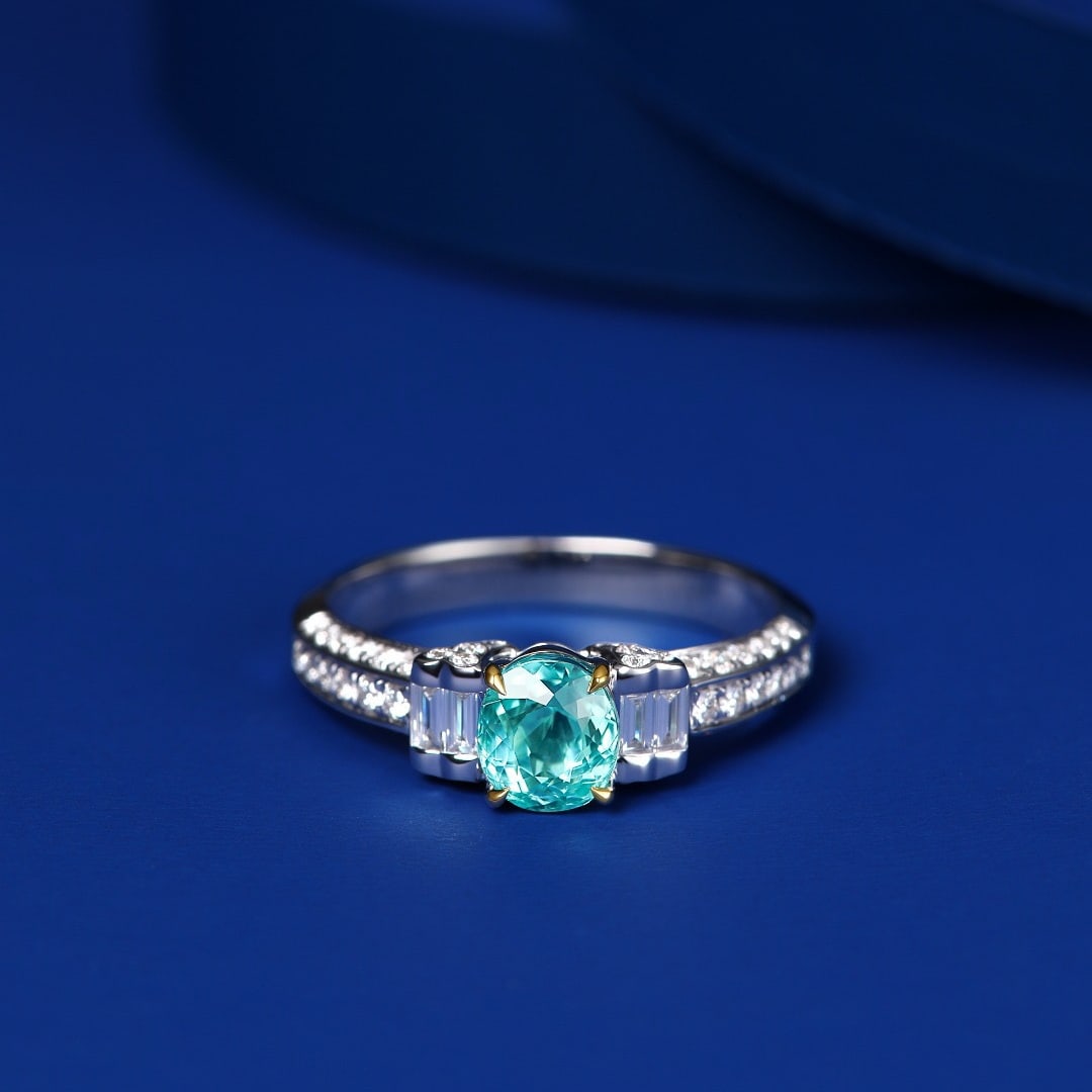 14k Gold 1.45 Ctw Natural Paraiba Tourmaline & Diamond Ring: Ref:231094074 // gold content:14k gold // ring size:7. 25us // // main gemstone:paraiba tourmaline // shape:oval // carat weight:1. 03ct // color:bluish green // treatment:natural // // adjacent